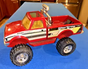Camion giocattolo Nylint Action Master Steer Crazy metallo rosso argento decalcomania ruote in gomma - Foto 1 di 23