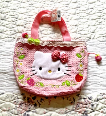 Bolso de Mano Pequeño Sanrio Hello Kitty con Dijes de Fresa Nuevo con Etiquetas Foto 1 de 4