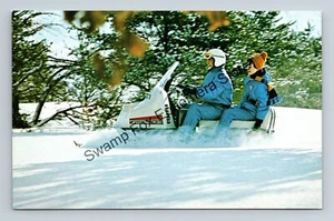 Postcard Winter Scene Man Woman Evinrude Snow Mobile Wisconsin - Imagen 1 de 2