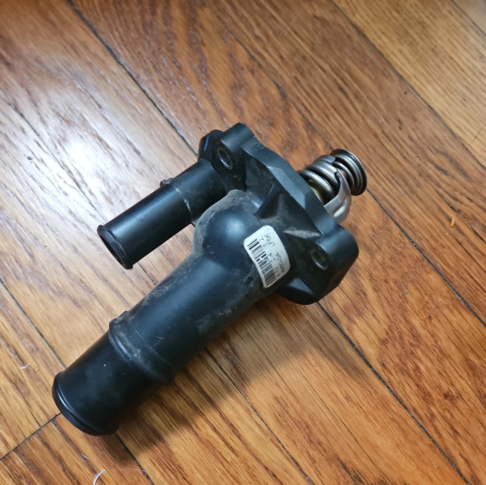 NEW GENUINE 2004 - 2009 MAZDA 3 2.0 L  & 2.3 L THERMOSTAT   - Image 1 of 4