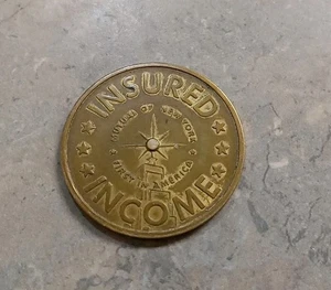 Antigua moneda de publicidad de seguros mutua de Nueva York token giratorio - Imagen 1 de 2
