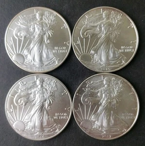 2014, 2015, 2016, and 2017 $1 American Silver Eagle Dollars - Picture 1 of 3