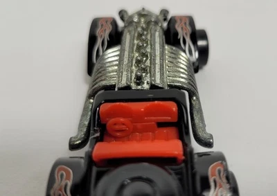 Hot Wheels Sweet 16 Negro Duesenberg 1970 Tubos laterales plateados, asientos rojos - Malasia Foto 1 de 4