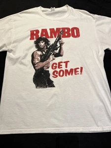 CAMISETA RAMBO VINTAGE 1985 RAMBO PRIMERA SANGRE CAMISA RARA CONSIGUE ALGUNOS L JERZEES grandes - Imagen 1 de 23