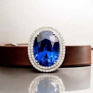 Anillo de boda de platino cultivado en laboratorio con zafiro azul de 28,16 quilates con diamantes naturales de corte ovalado - Imagen 1 de 9