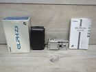 Canon Elph Z3 Point & Shoot Film Camera Silver New Battery Zoom Lens with case.