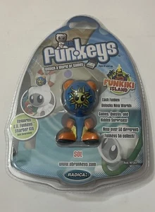 UB Funkeys Sol Funkiki Island Unlock a World of Games Radica Mattel NUEVO 2007 - Imagen 1 de 2