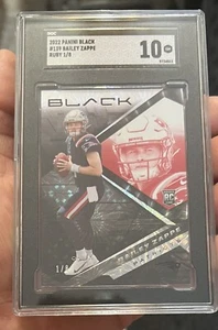 2022 Panini Black #139 Bailey Zappe RC FOTL Exclusive Ruby Parallel 1/8 SGC 10 - Picture 1 of 2