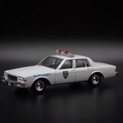 Chevrolet Caprice 1989 89 policía de Nueva York policía modelo coche fundido a presión escala 1/64 Foto 1 de 4