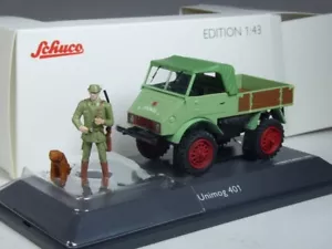 (KI-11-37) Schuco 450254800 Unimog U 401 mit Jäger und Hund in 1:43 in OVP - Bild 1 von 1