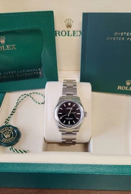 NUEVO 2025 sin usar Rolex Oyster Perpetual 277200 31MM esfera negra, acero, caja papeles Foto 1 de 4