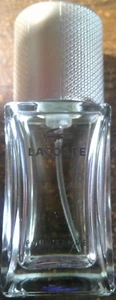 LACOSTE POUR FEMME EAU DE PARFUM 0.5oz (75% still remains in the spray bottle) - Picture 1 of 3