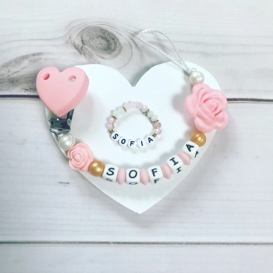 Schnullerkette Nuckelkette Armband Set mit Namen Silikon rosa weiß gold - Bild 1 von 1
