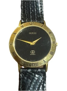 Reloj GUCCI 3000M Vintage Esfera Negra Tono Dorado, Nueva Banda Lagarto - Imagen 1 de 4