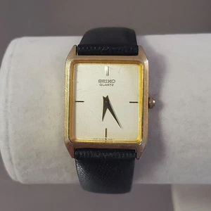 Orologio SEIKO Vintage Donna Tono Oro Cinturino Pelle Nero Analogico Quarzo 25mm - Foto 1 di 15