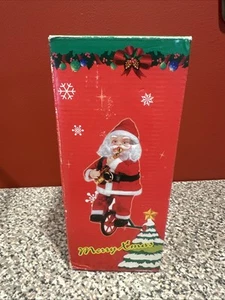 Christmas Santa Claus Musical Toy Rides Unicycle Figurine SH4 - Picture 1 of 6