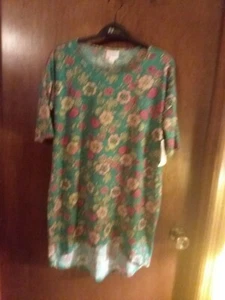 Lularoe irma xxs new. Longer In Back, pretty florial. Feels soft. Cute. - Picture 1 of 5