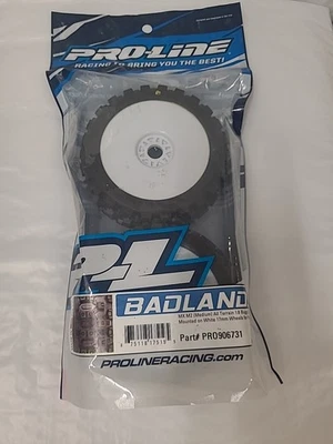 Pro-Line Badlands MX Pre-Mounted 1/8 Buggy Tires White M2 w/Velocity V2 Wheels - Image 1 of 4