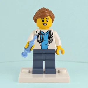 Female LEGO Doctor Minifigure with Syringe and White Baseplate - Medical Worker - Picture 1 of 3