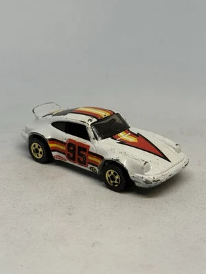 Coche fundido a presión Hot Wheels 1974 The Hot Ones P-911 Porsche #95 dorado blanco Hong Kong Foto 1 de 4