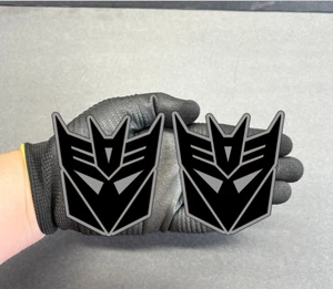 2x Máscara Decepticon Transformer GRABADA Guardabarros Coche Insignia Emblema MULTICOLOR Calcomanía - Imagen 1 de 24