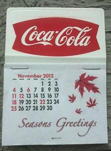 NEW 2013 red fishtail  Coke dash calendar