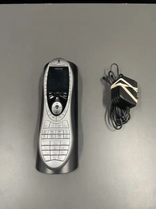 Mando a distancia universal Logitech Harmony 890 y cargador L-LG7 probado para alimentación - Imagen 1 de 4