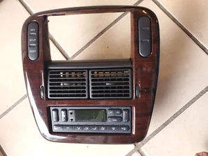 02-05 FORD EXPLORER CENTER DASH RADIO TRIM BEZEL WOODGRAIN W/ AC VENTS OEM - Picture 1 of 4