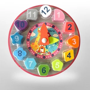 Juego clasificador de formas de reloj de madera J'adore madera natural juguete educativo colores números - Imagen 1 de 4