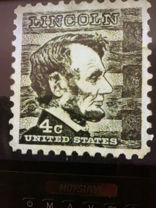 Black Lincoln 4 Cent Stamp - Picture 1 of 4