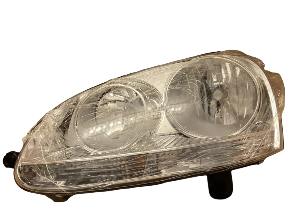 Faro lateral izquierdo para Volkswagen GTI/Jetta 2005-2014 4 puertas vagón automático 2014 Foto 1 de 4