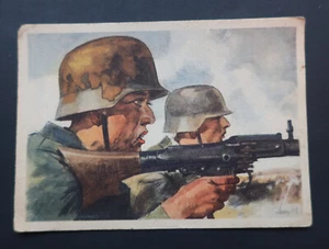 Orig. Cartolina "Al leggero MG34" con elmetto in acciaio mimetico 1943 - Foto 1 di 2