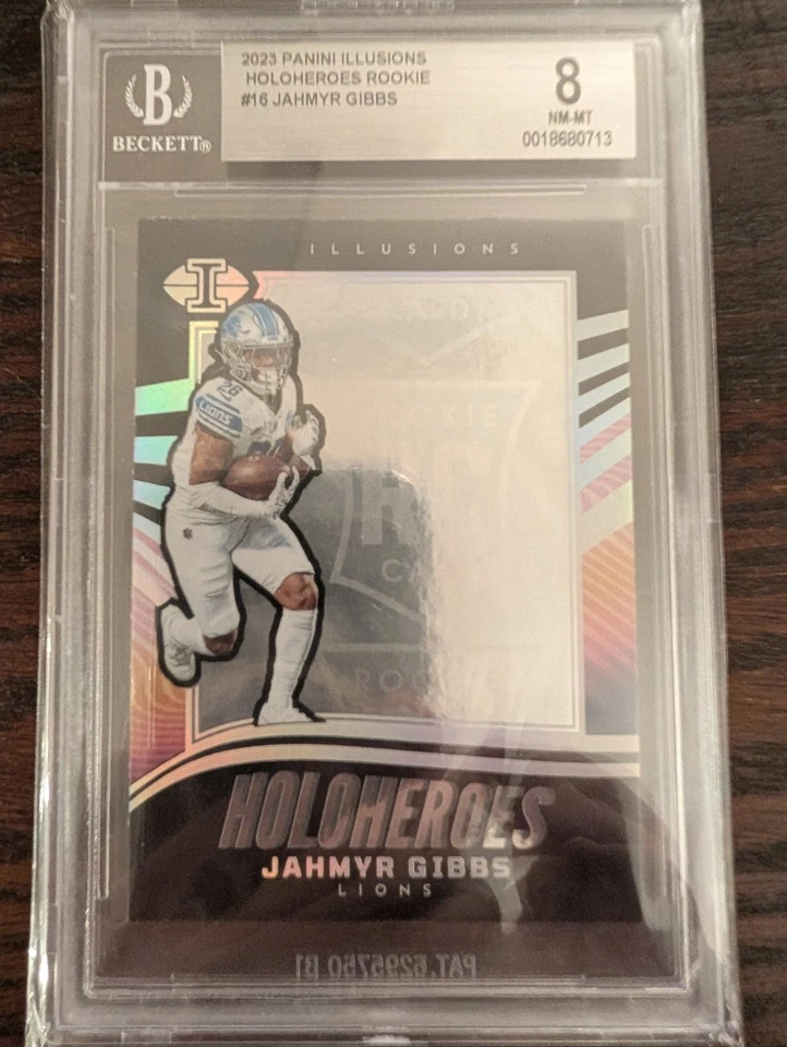2023 Panini Illusions Holoheroes Rookie #16 Jahmyr Gibbs BGS 8 - Image 1 of 2