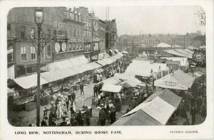 PRINTED POSTCARD OF LONG ROW, NOTTINGHAM, DURING GOOSE FAIR, NOTTINGHAMSHIRE - Picture 1 of 2