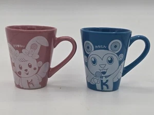 Juego de 2 tazas de cerámica rosa azul Karaokekan Japón - Imagen 1 de 4