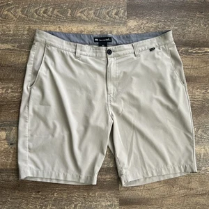 Pantaloncini Travis Matthew uomo 40 beige cachi 9 pollici cuciture interne golf preppy elasticizzati difetto - Foto 1 di 9