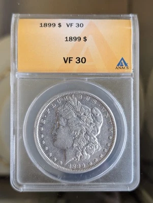 Dólar de plata Morgan de los Estados Unidos 1899 en estado bastante bueno 30 ANACS Foto 1 de 4