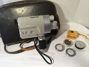 VINTAGE MINOLTA ZOOM 8 HOME MOVIE CAMERA 8mm W/ leather case,3 Extra Lenses,Film