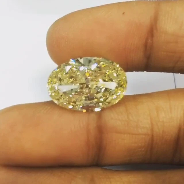 2 Ct fancy yellow color Oval Cut VVS1 Diamond Premium Quality Loose Gemstone 7x9 - Image 1 of 3