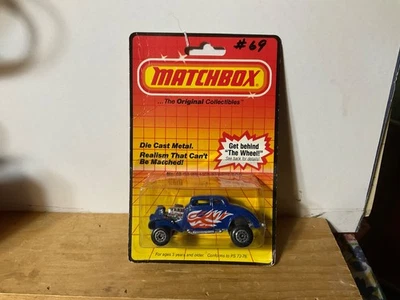 Matchbox 1983 MB 69 33’ Willy’s Street Rod color is blue with white & orange. - Image 1 of 4