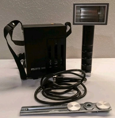 Metz 202 Flash unit, sync cord, battery holder, strap - untested - Image 1 of 4