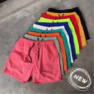Pantaloncini corti estivi da spiaggia uomo sportivi casual asciugatura rapida tinta unita surf shorts - Foto 1 di 34