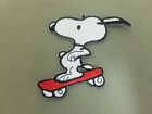 Patch brodé skateboard Snoopy.