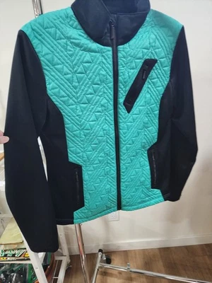 Chaqueta de equitación ligera acolchada marca Cruel para niñas talla S aguamarina/negra Foto 1 de 4