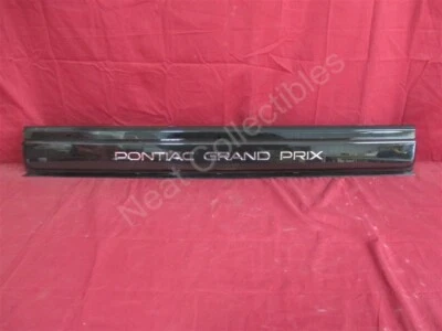 NOS OEM Pontiac Grand Prix Tail Lamp Panel Filler 1988 - 1993 - Image 1 of 4