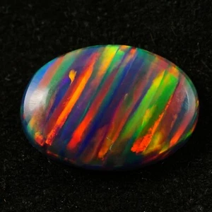 Schwarzer Feueropal oval Cabochon 10x8 mm 1,2 kt AAA + australischer loser Edelstein - Bild 1 von 4