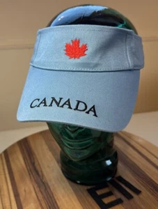NWOT CANADA BLUE VISOR HAT WITH RED LEAF ICON.  ADJ STRAPBACK NEVER WORN.   E11 - Picture 1 of 3