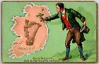 1909 St. Patrick's Day Greeting Irishman Offering Shamrocks to Ireland Postcard