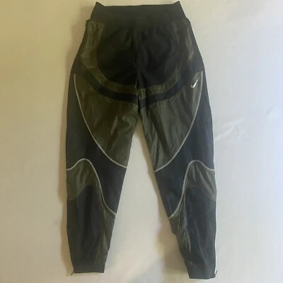 Pantalones Nike NRG ISPA para mujer XS Futurista Moderno Cortavientos Entrenamiento Gimnasio Deportes Foto 1 de 4