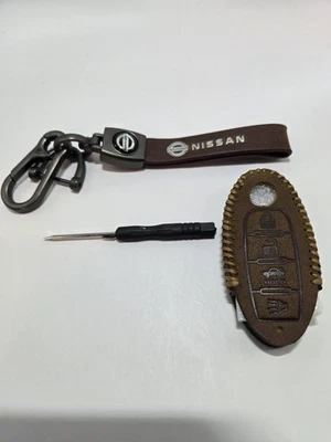 1 X LLAVERO CUERO MARRÓN MÁS FUNDA LLAVERO CUERO/NISSAN Foto 1 de 2